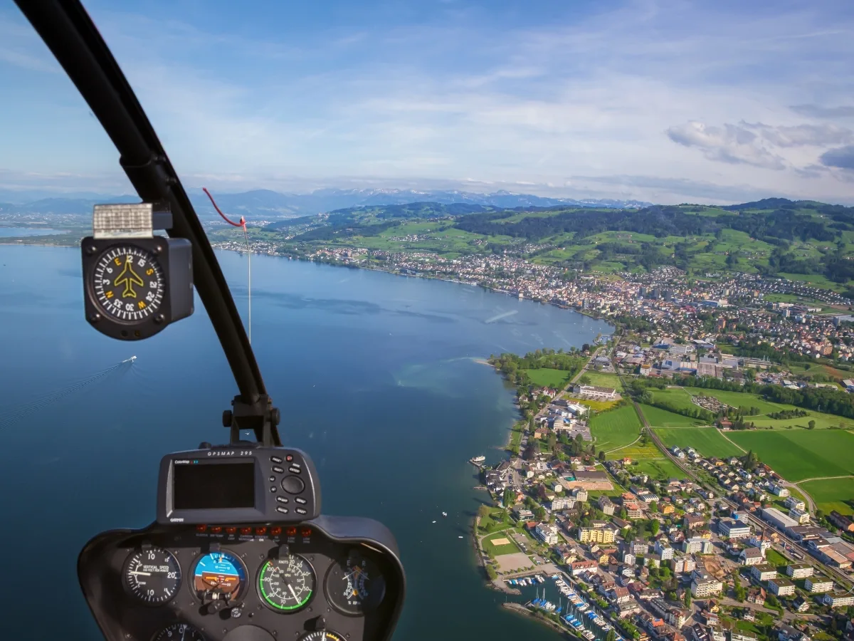 View from a helicopter over a lake.